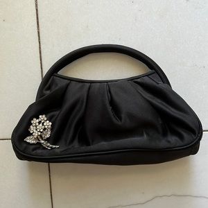 Small Black Purse with Flower Pin
